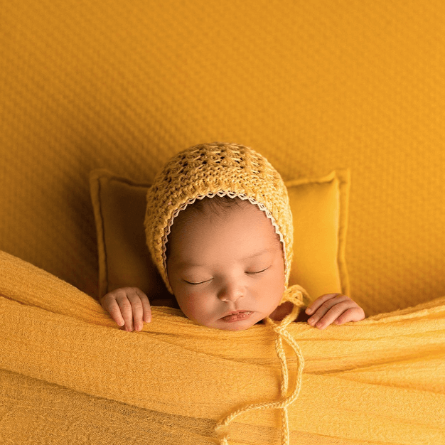 newborn yellow hat